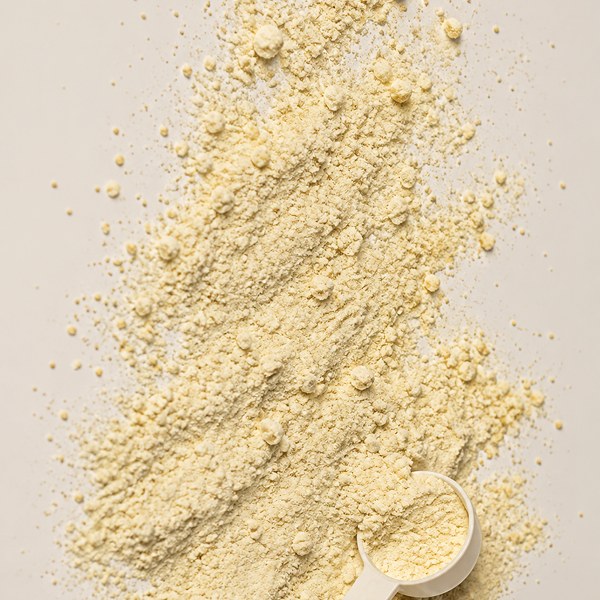 Vitamin B12 powder with a scoop
