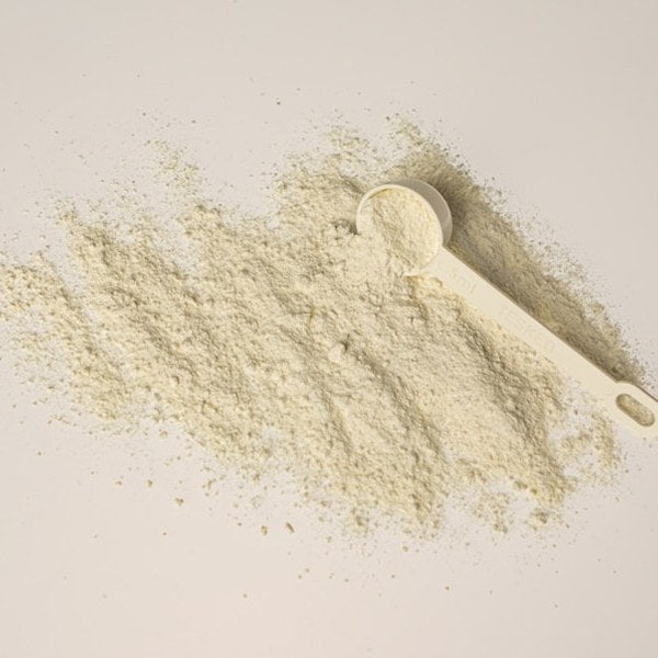 Vitamin B5 powder with a scoop